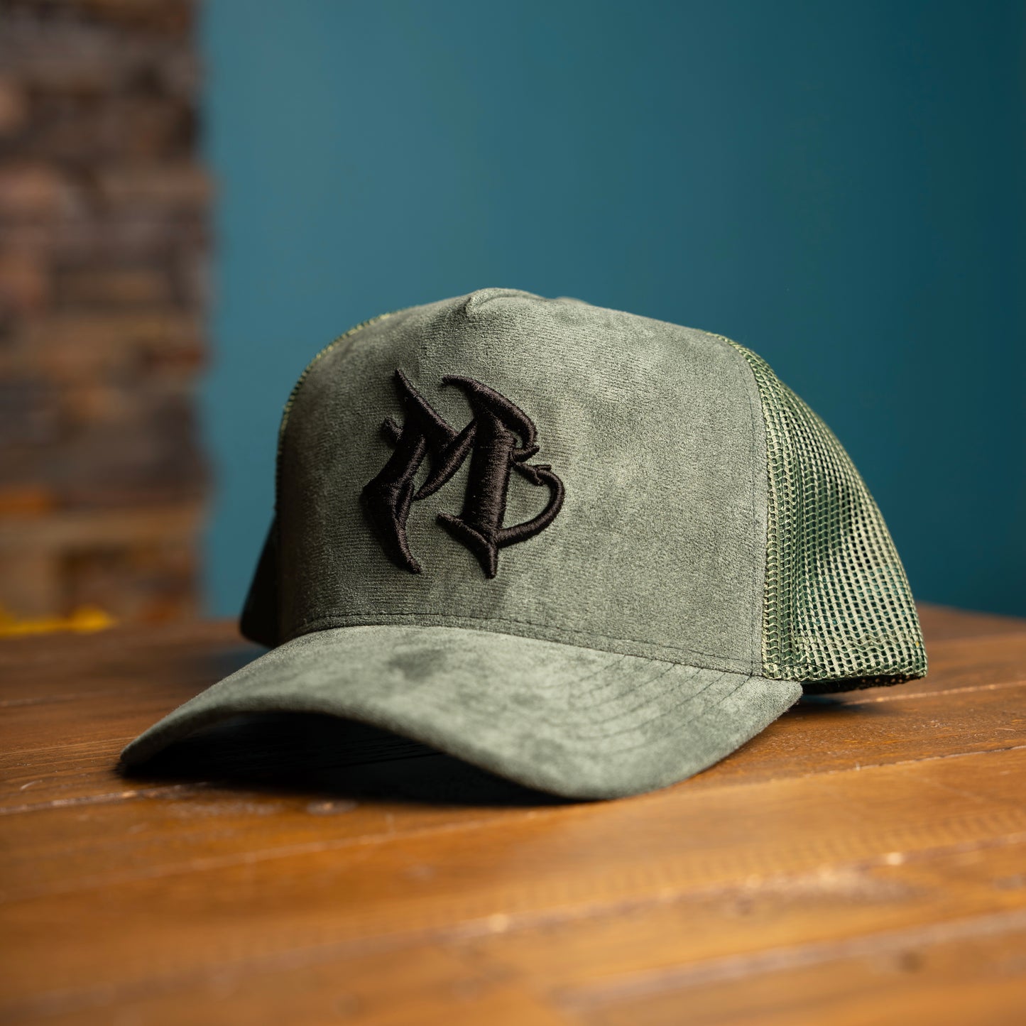 Green "M" Suede - La Malicia
